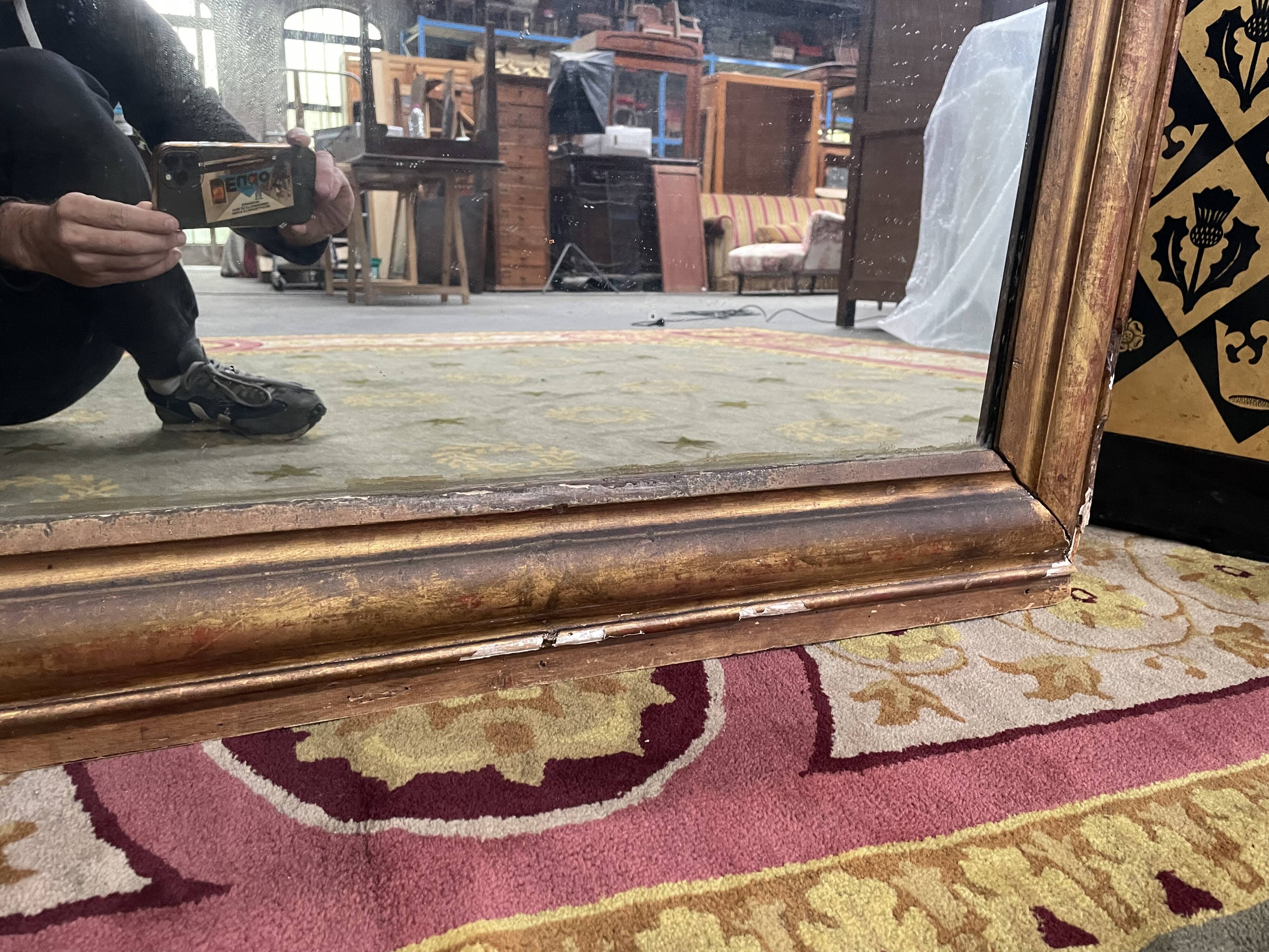 Louis Philippe period mirror with 19th leaf