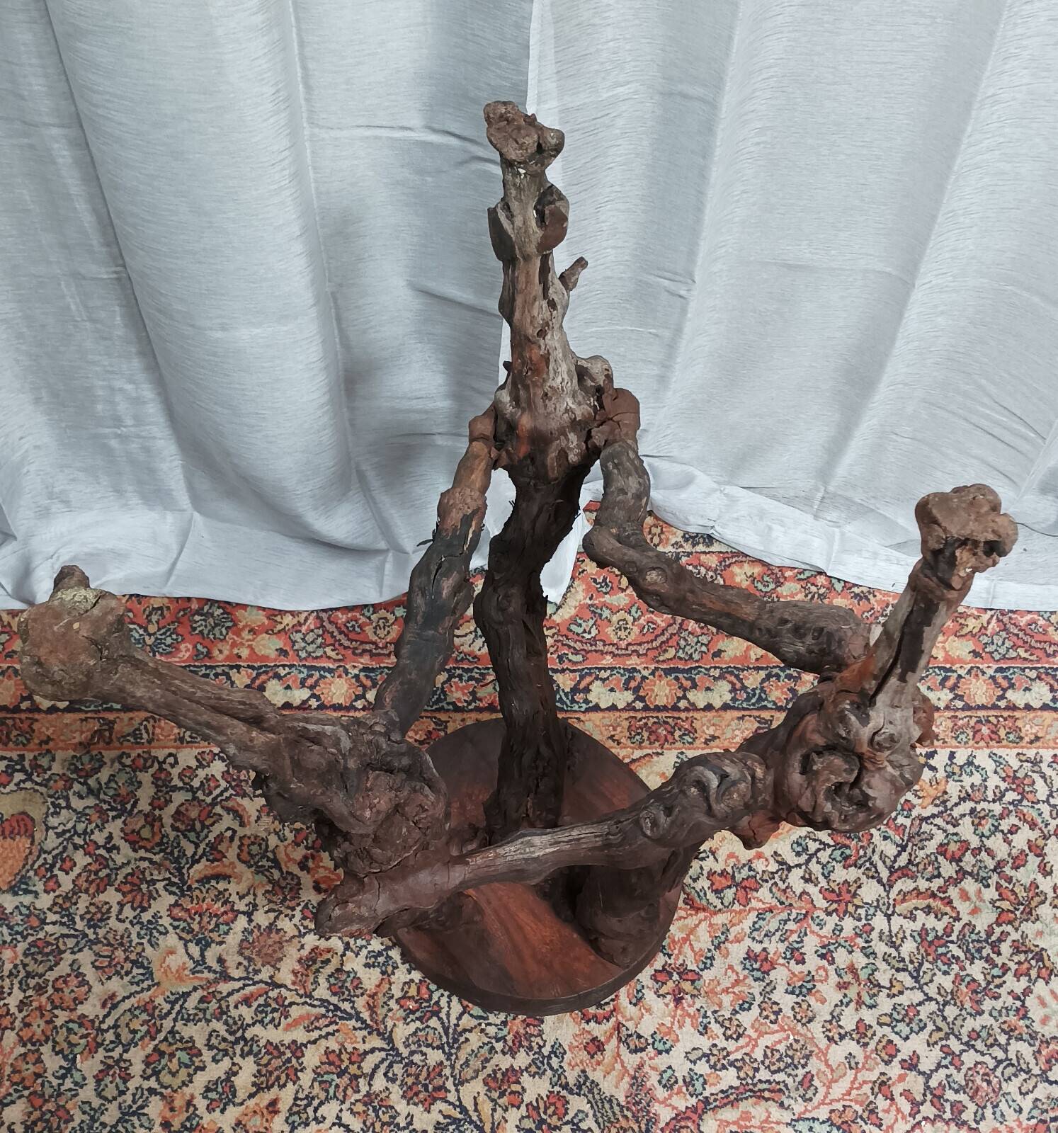 Brutalist bar stool made of vine wood