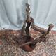 Brutalist bar stool made of vine wood