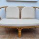 Vintage two-seater natural rattan sofa with cotton cushions, 140 cm