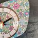 Vintage formica clock silent asymmetrical wall pendulum "Flowered blue purple"