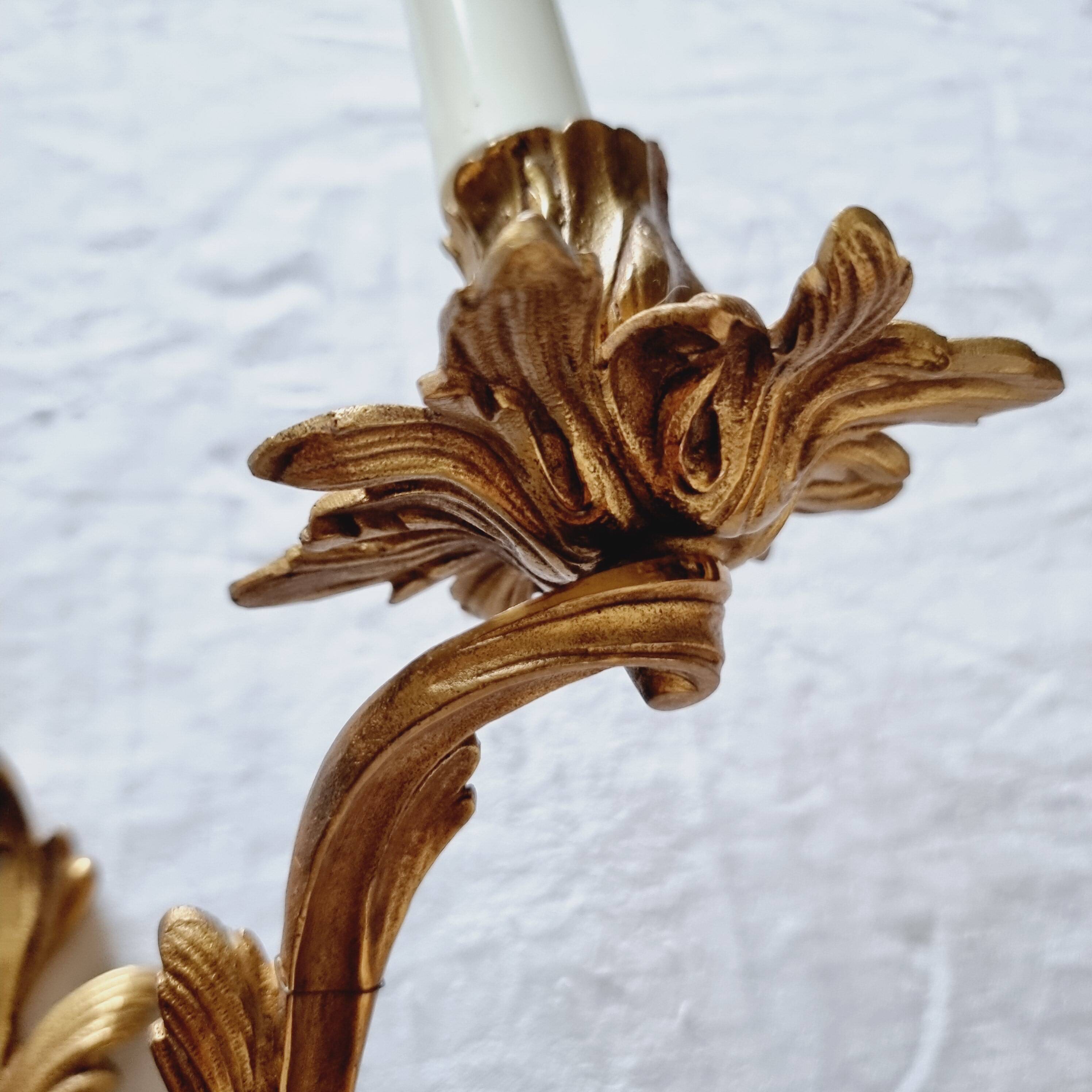 Pair of vintage French wall sconces in bronze, Louis XV Rococo style.