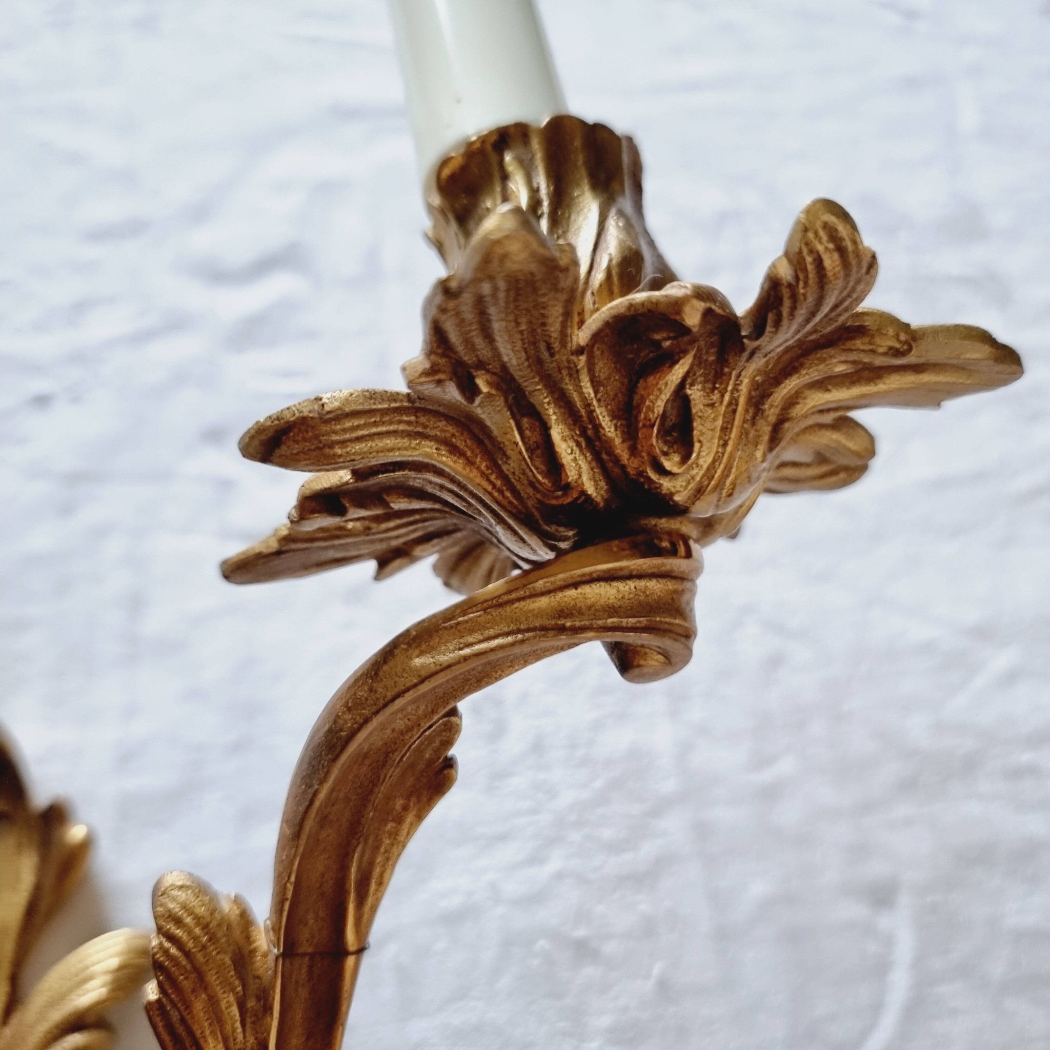 Pair of vintage French wall sconces in bronze, Louis XV Rococo style.