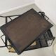 Perforated metal serving trolley in the Mathieu Matégot style