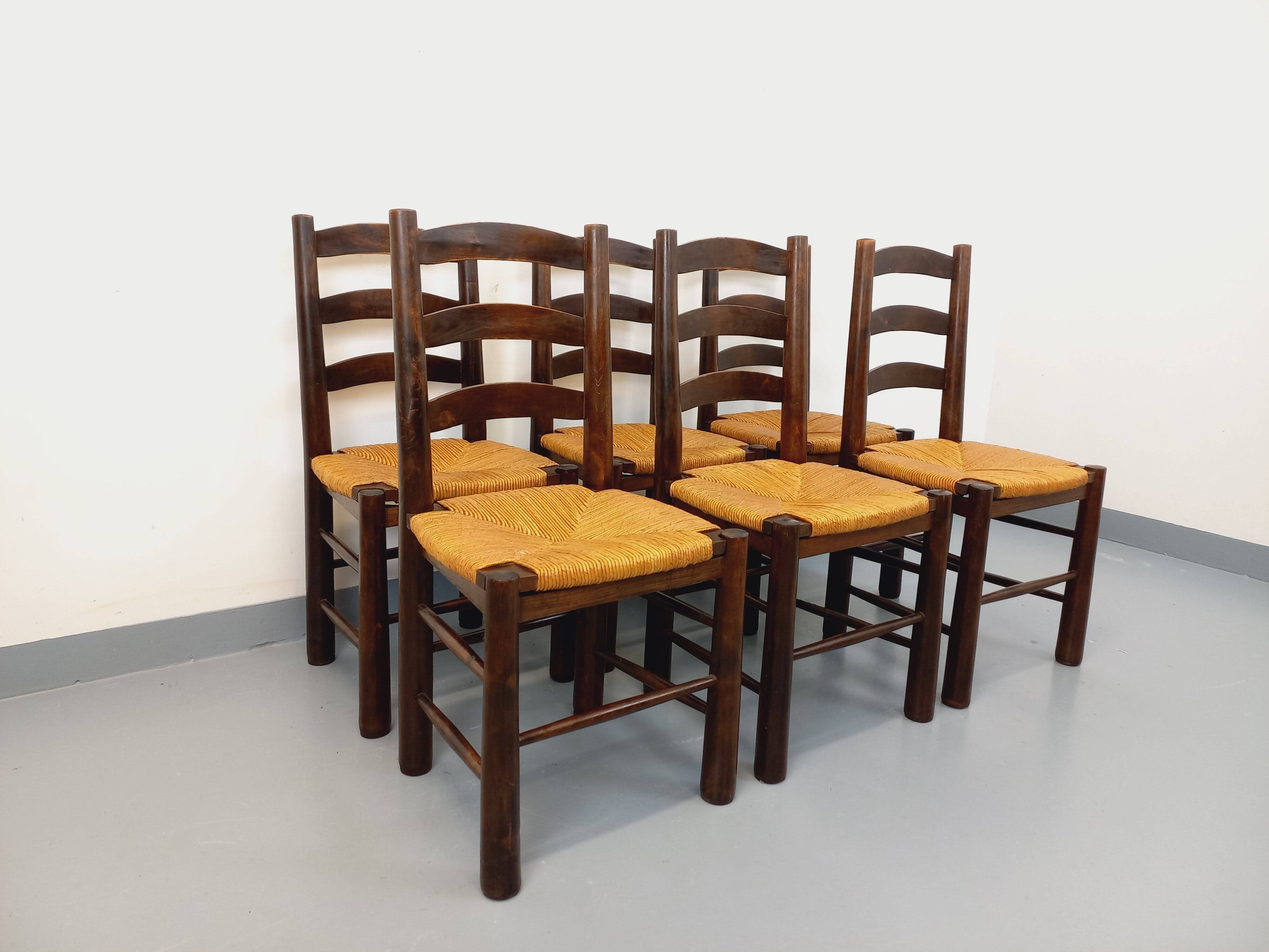 Set of 6 vintage brutalist chairs by Georges Robert in straw wood from the 1960s.