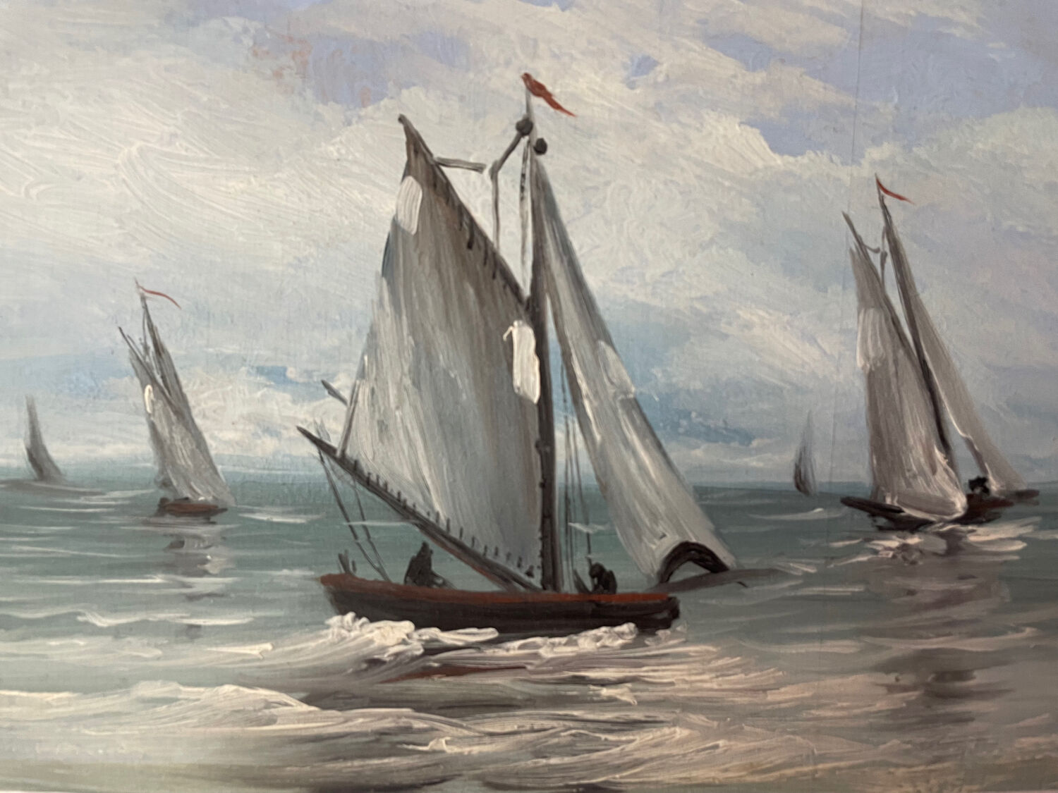 A pair of old paintings on wood.