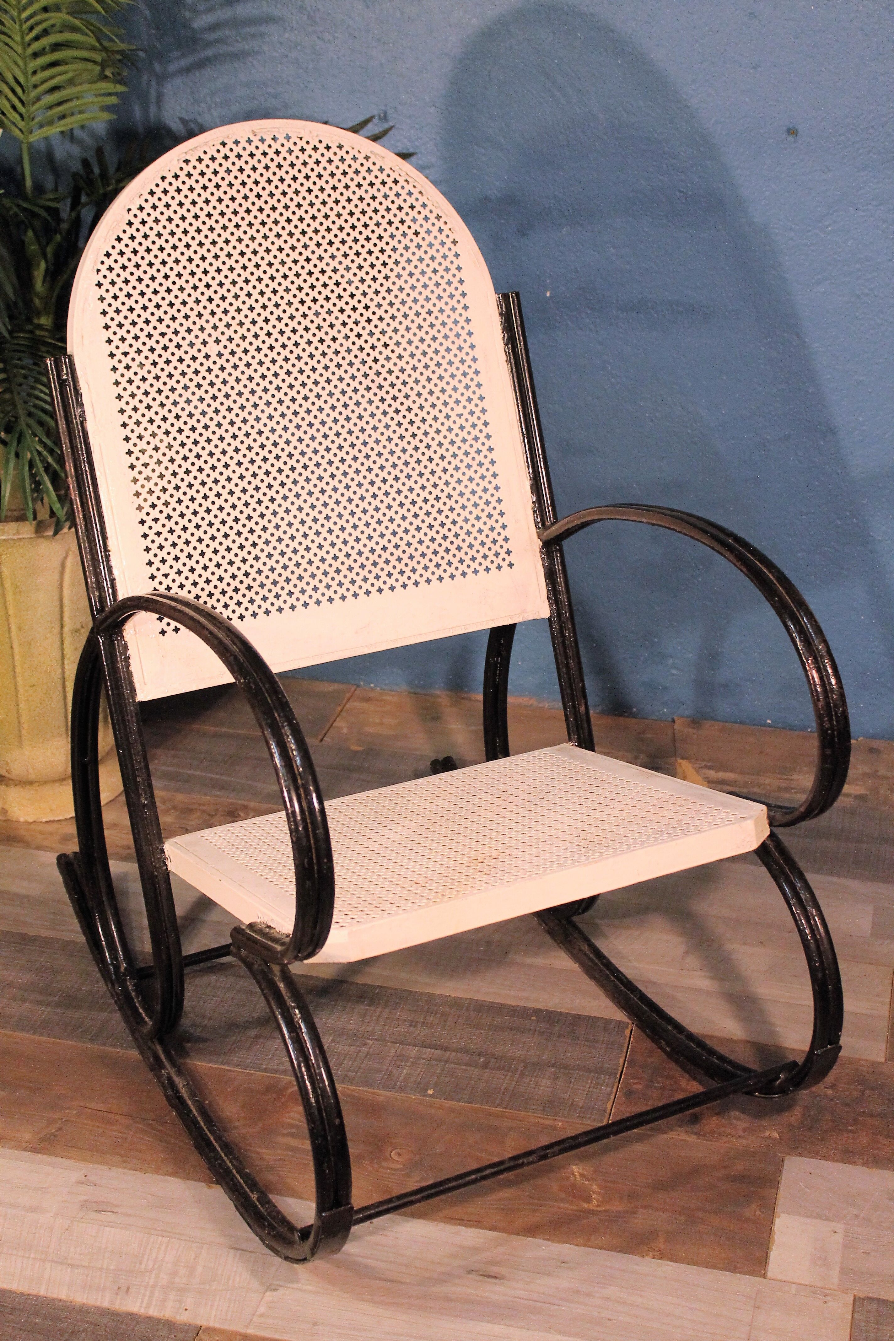 1950s perforated metal rocking chair
