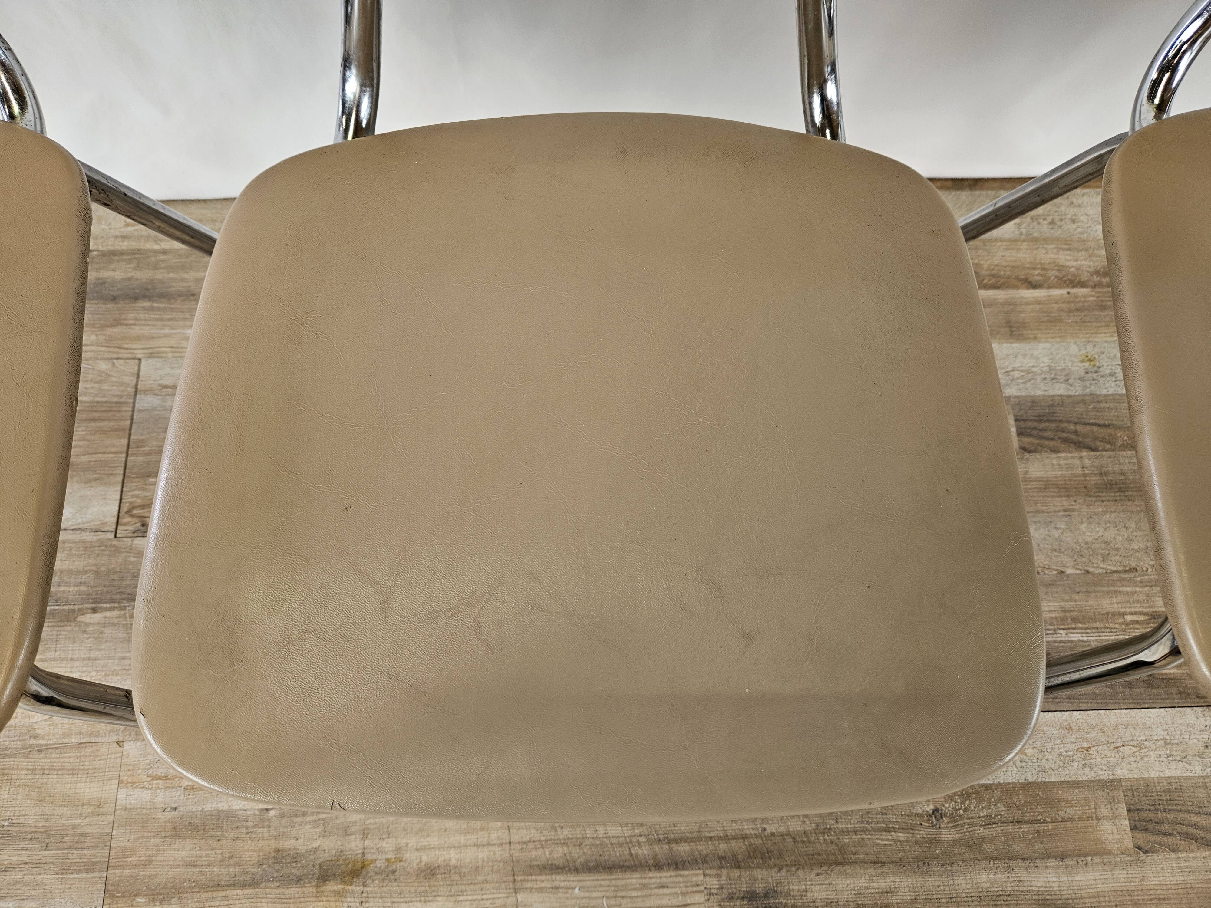 Set of four chairs in iron and skai 1970