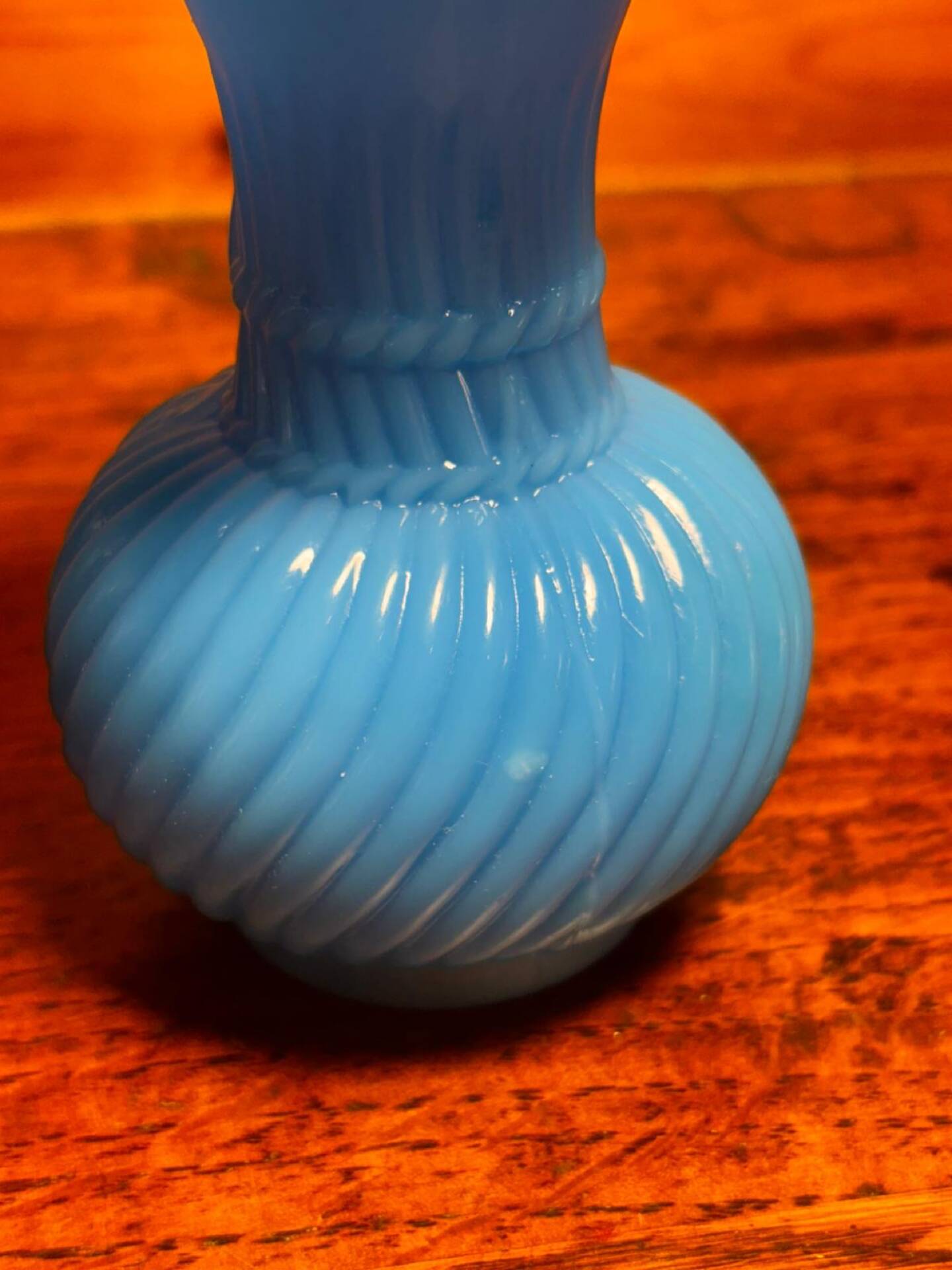 Blue opaline vase, opaque glass, wavy neck/rim, relief decoration of a bow.