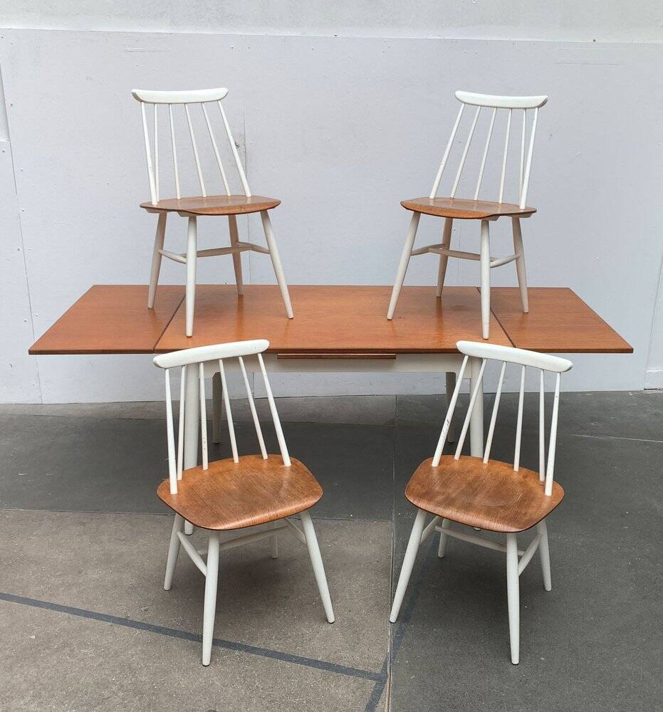 Teak mid-century table and Fanett chairs by Ilmari Tapiovaara for Asko, set of 5.