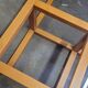 Modernist vintage square coffee table, in wood and old glass