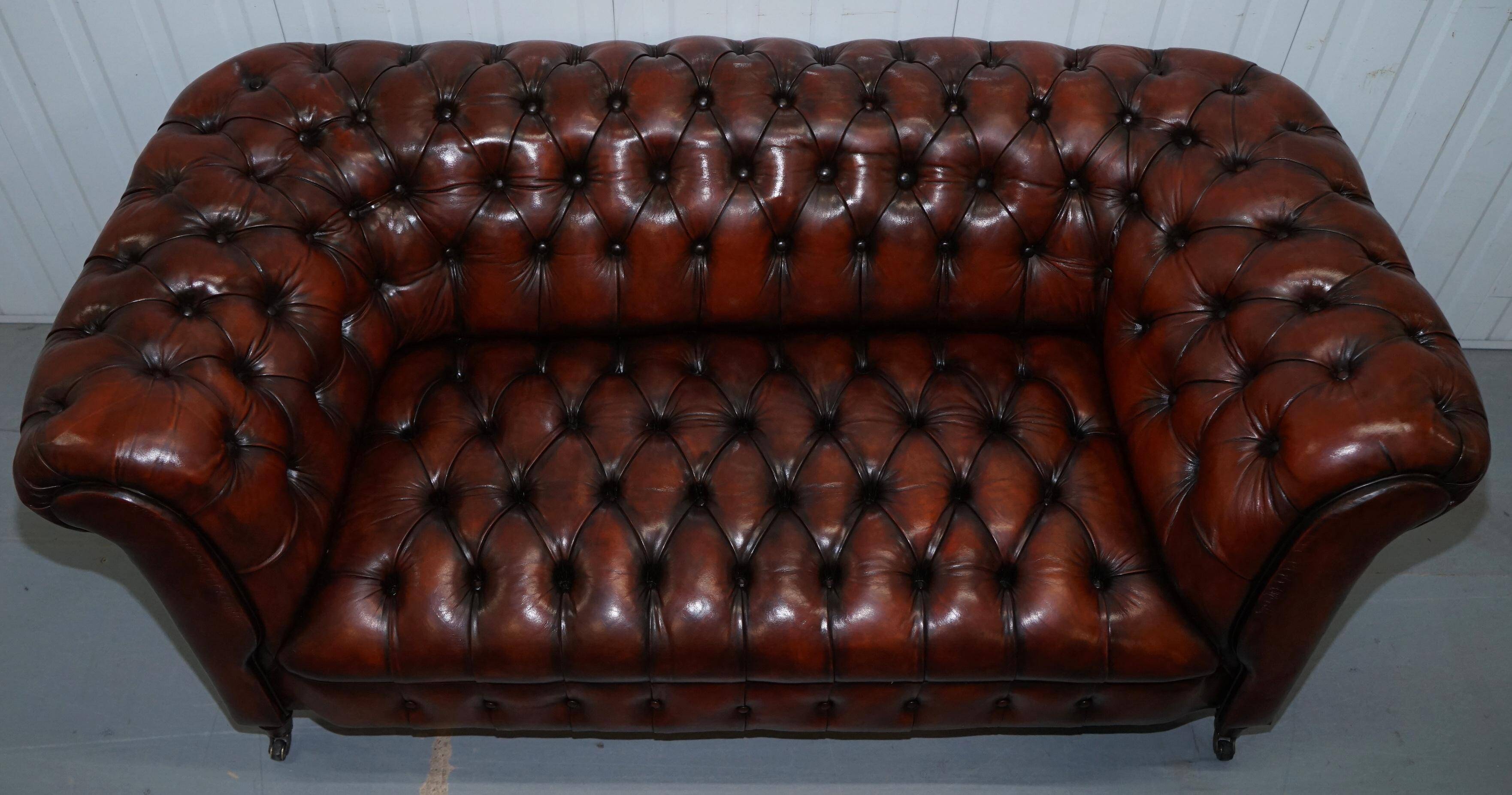 Small Victorian leather Chesterfield sofa
