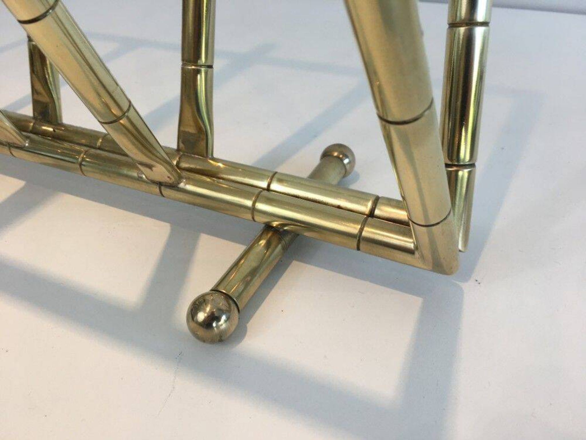 Brass faux-bamboo style magazine rack