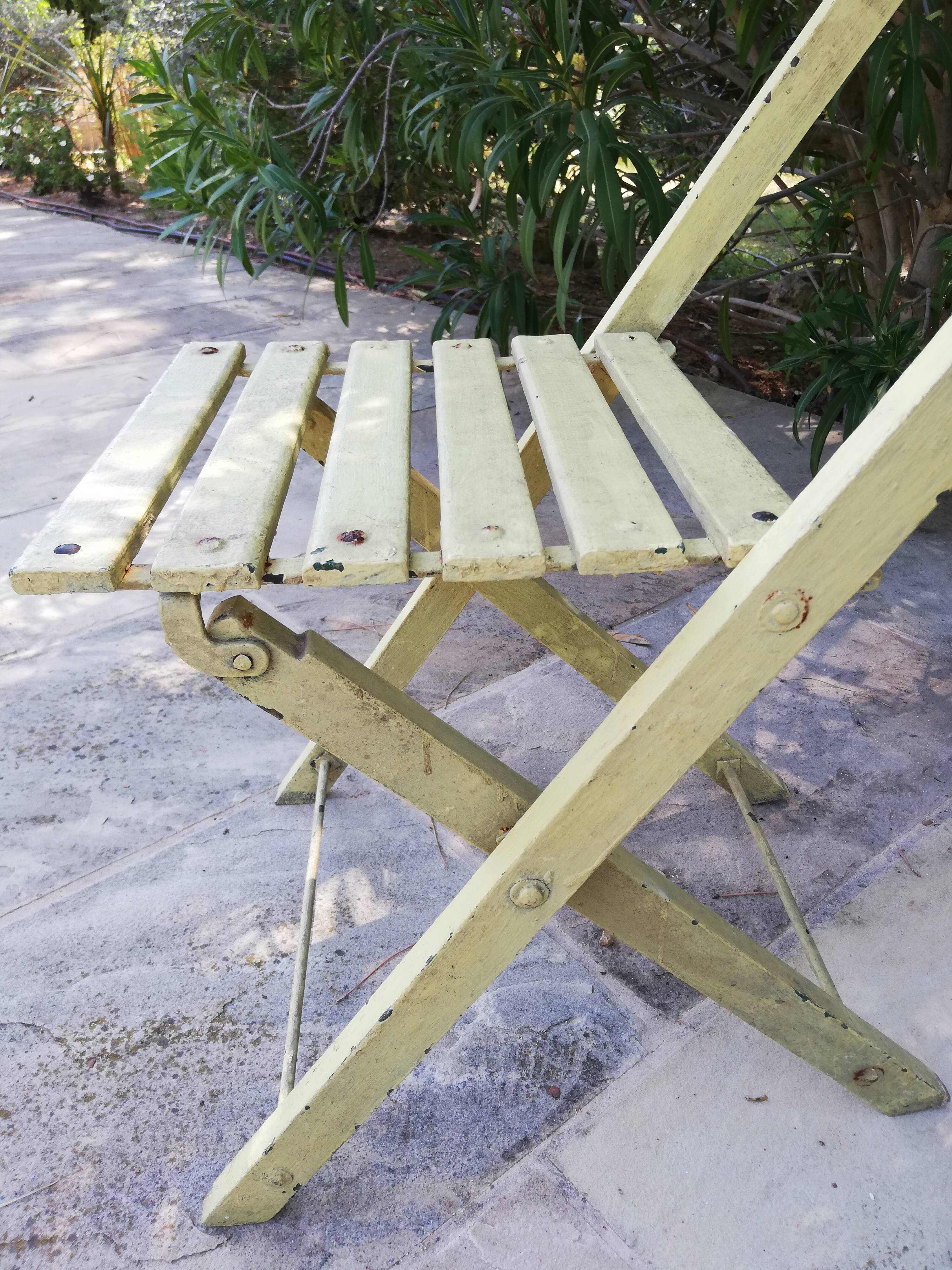 Two folding garden chairs