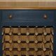 Vintage wine rack furniture for 36 bottles with drawer.