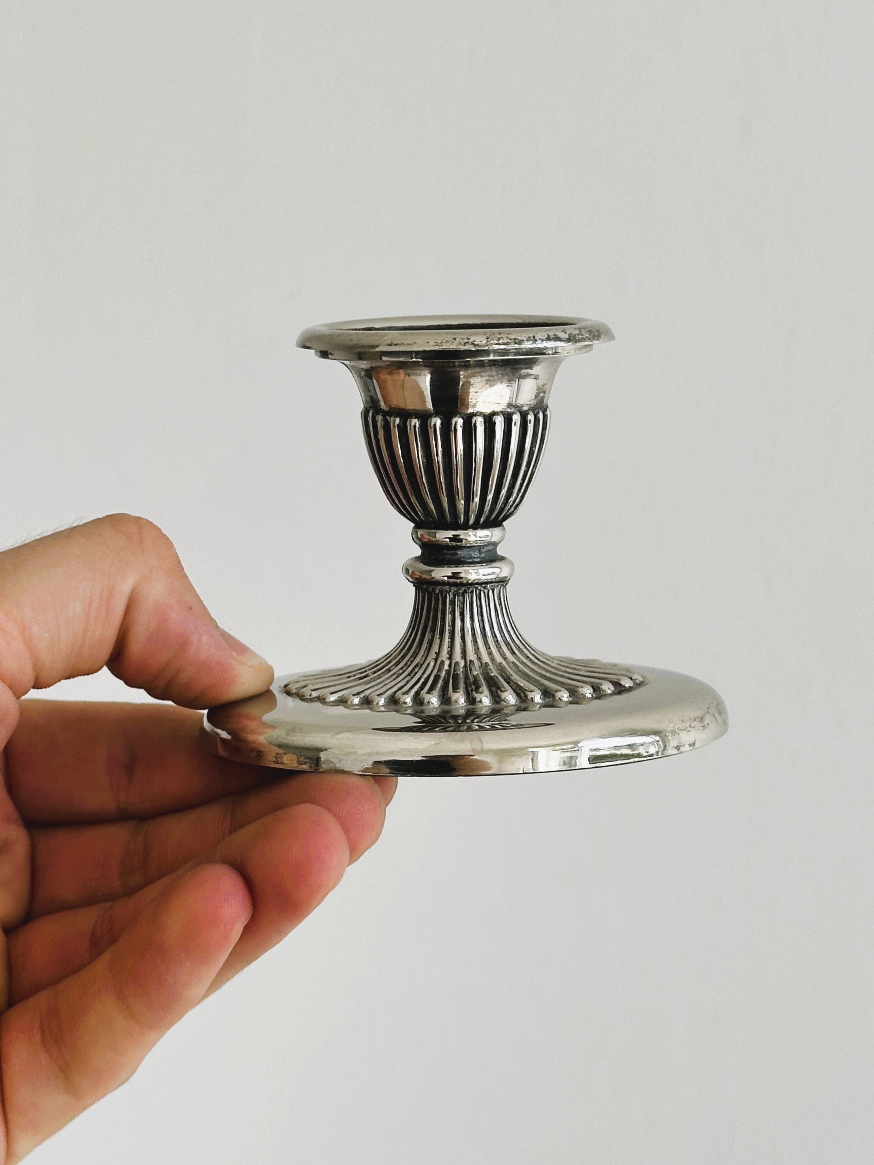 Pair of antique metal candlesticks