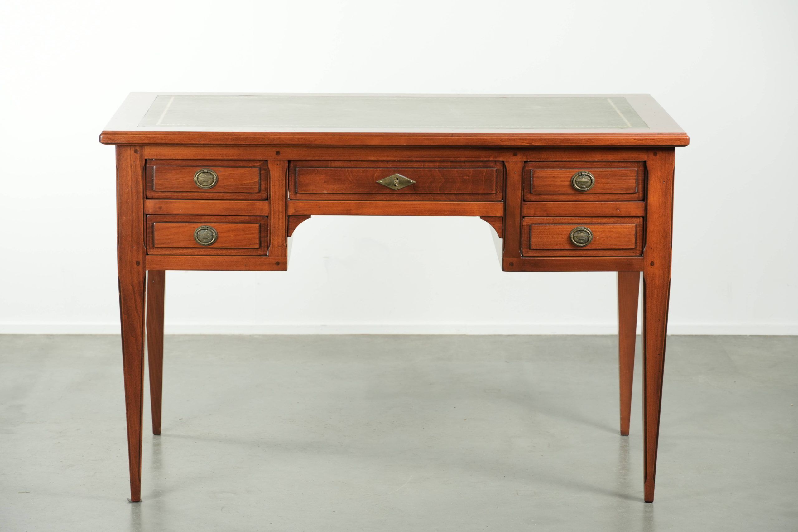 Elegant English style desk with green leather top, gold details and drawers