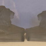 Pair of paper presses depicting lions