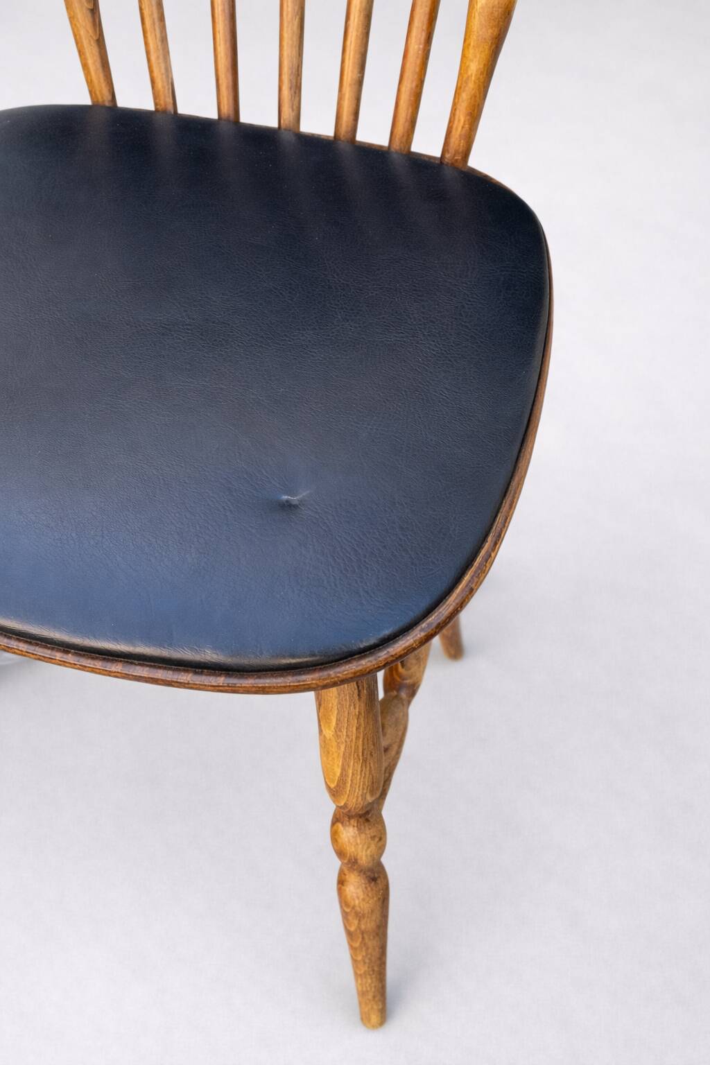 Set of 4 Baumann "Menuet" chairs – stained beech and black faux leather – French design