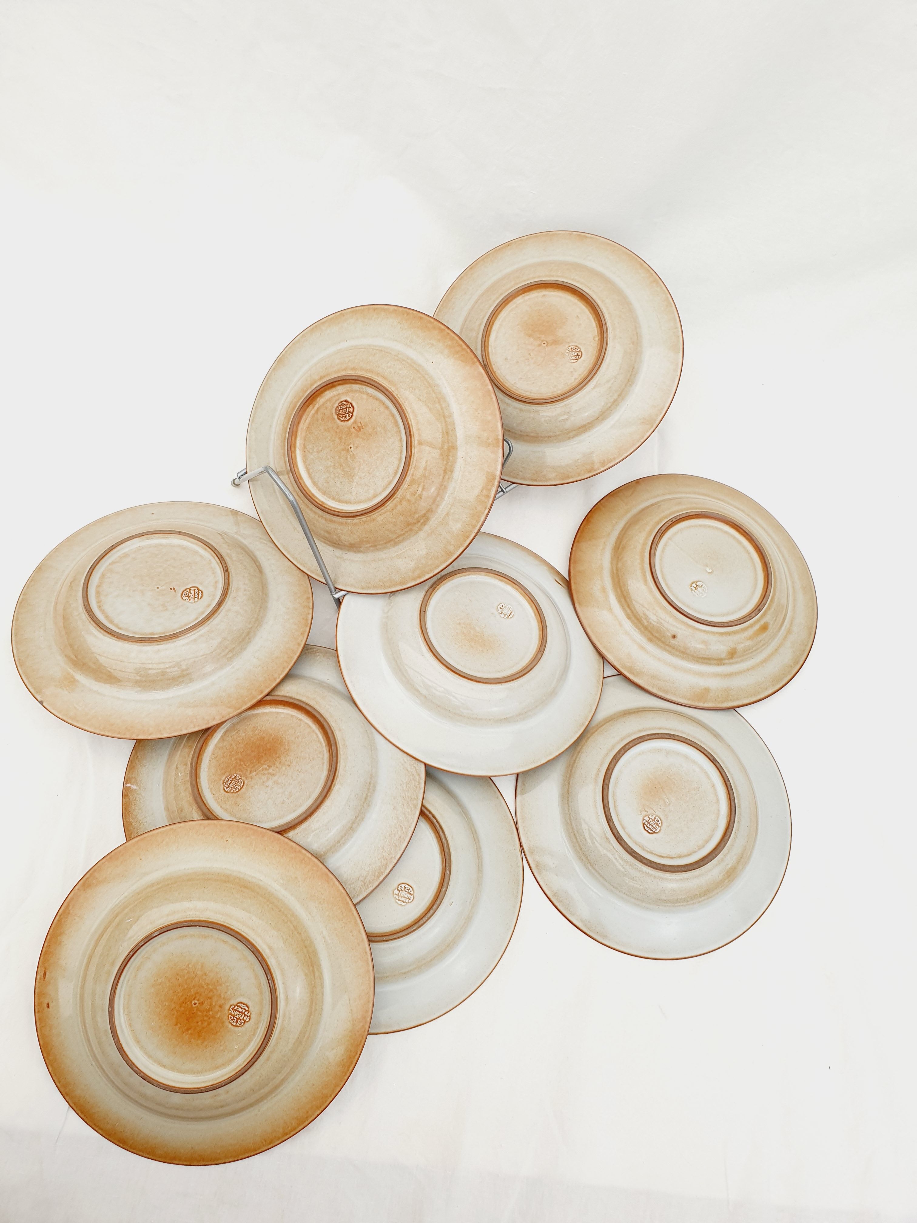 Series of 9 hollow plates pond sandstone