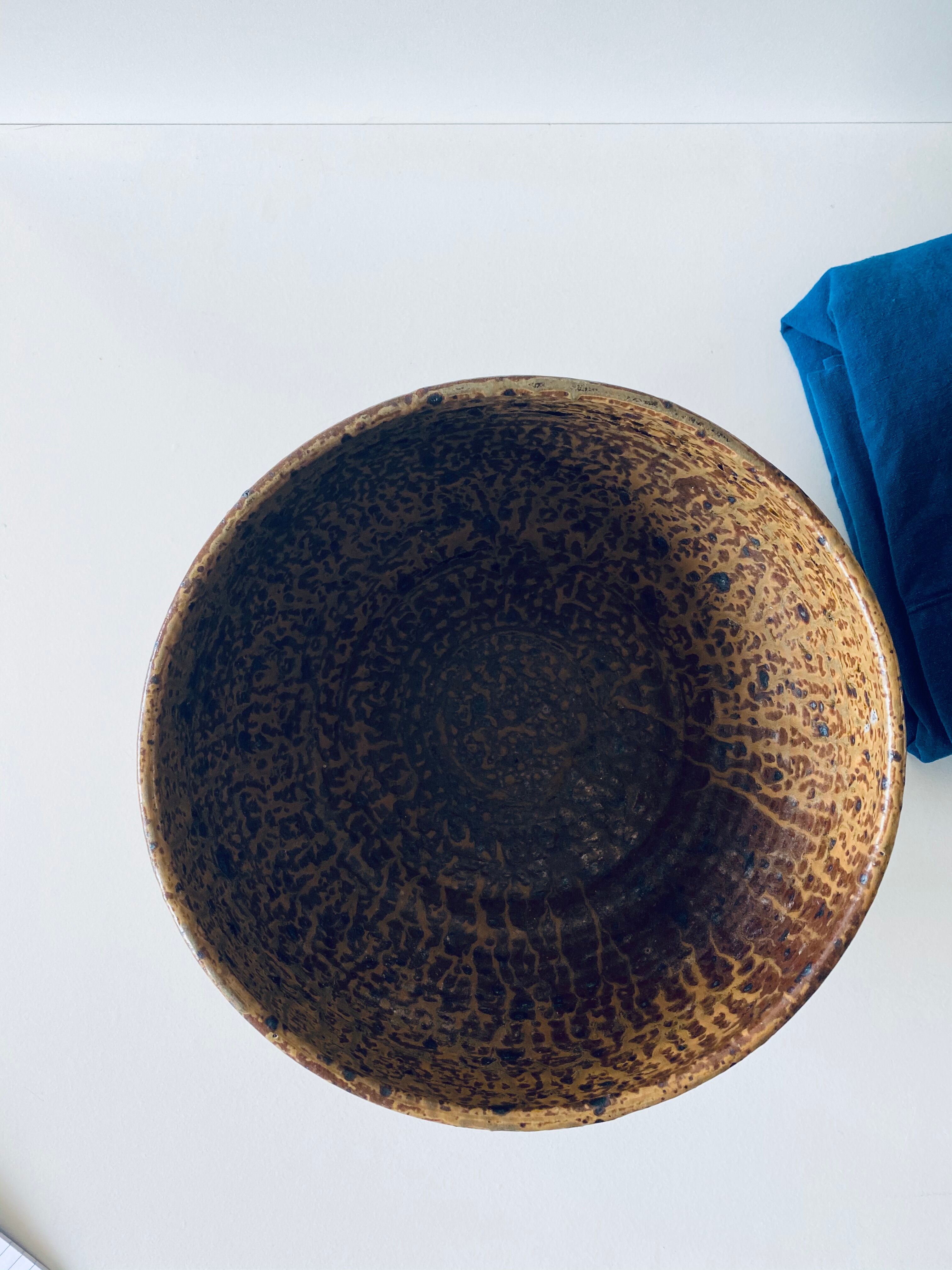 Signed sandstone bowl