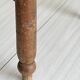 Triangular turned wooden stool