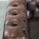 Dark brown cow leather vintage 2-seater Chesterfield sofa in English style