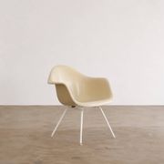 Eames fiberglass armchair by herman miller with white lax base