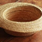 Old straw hat with black ribbon