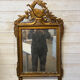 Neoclassical mirror in gilded wood