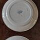 Série de huit assiettes plates terre de fer Géon Rouard décor Lille années
