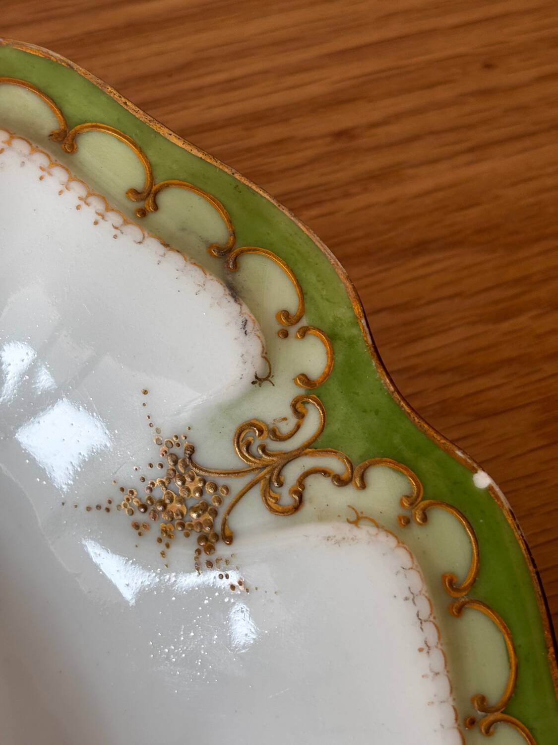 Vintage serving dish with green and gilt defects, Limoges porcelain