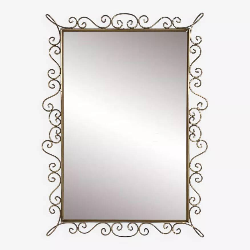 Rectangular mirror from the 50s-60s on a brass frame.