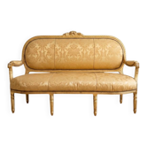 Banquette d’époque style Empire – Bois sculpté, tissu damassé, mobilier ancien