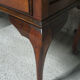 Old desk in cherry and green leather
