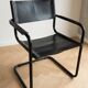 Vintage Bauhaus style cantilever armchair in black metal and leather.