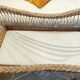 Rattan and wrought iron cradle
