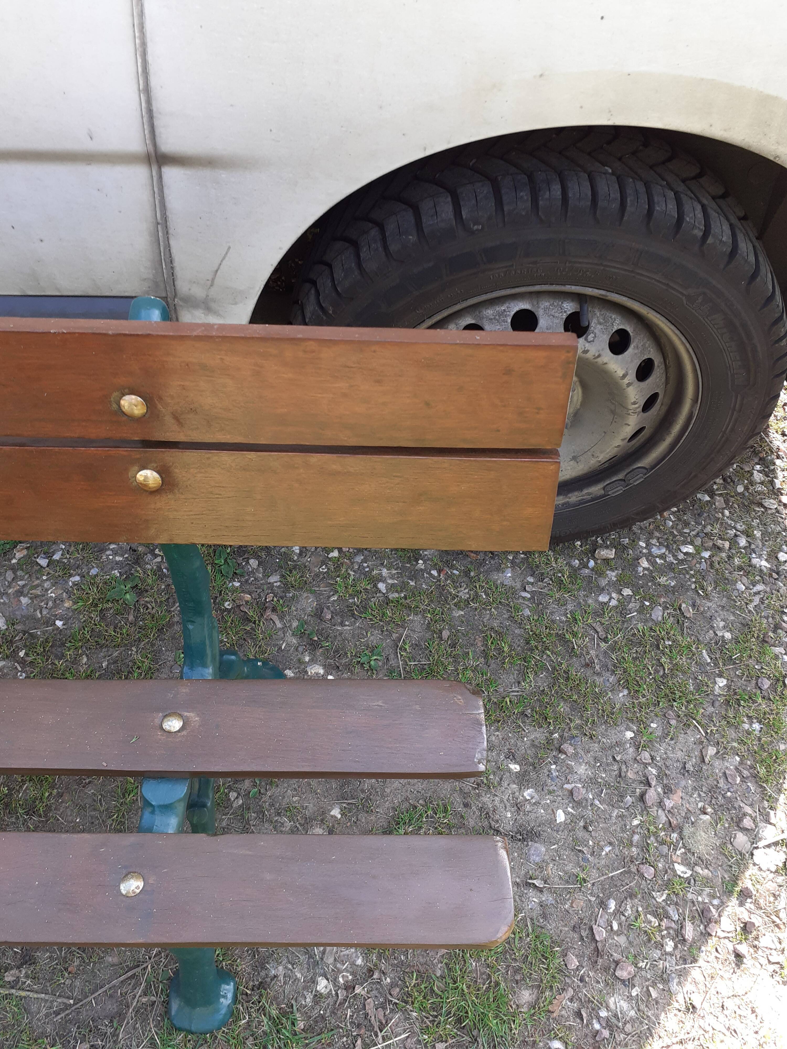 Old garden bench with cast iron feet