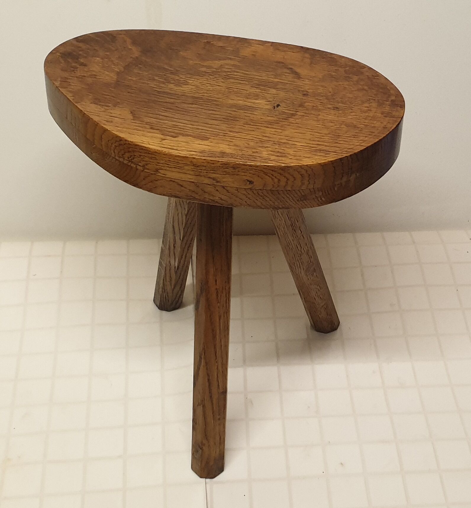 Wooden tripod stool