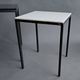 Pair of modernist nesting tables in black metal and white and black opaline 1960.