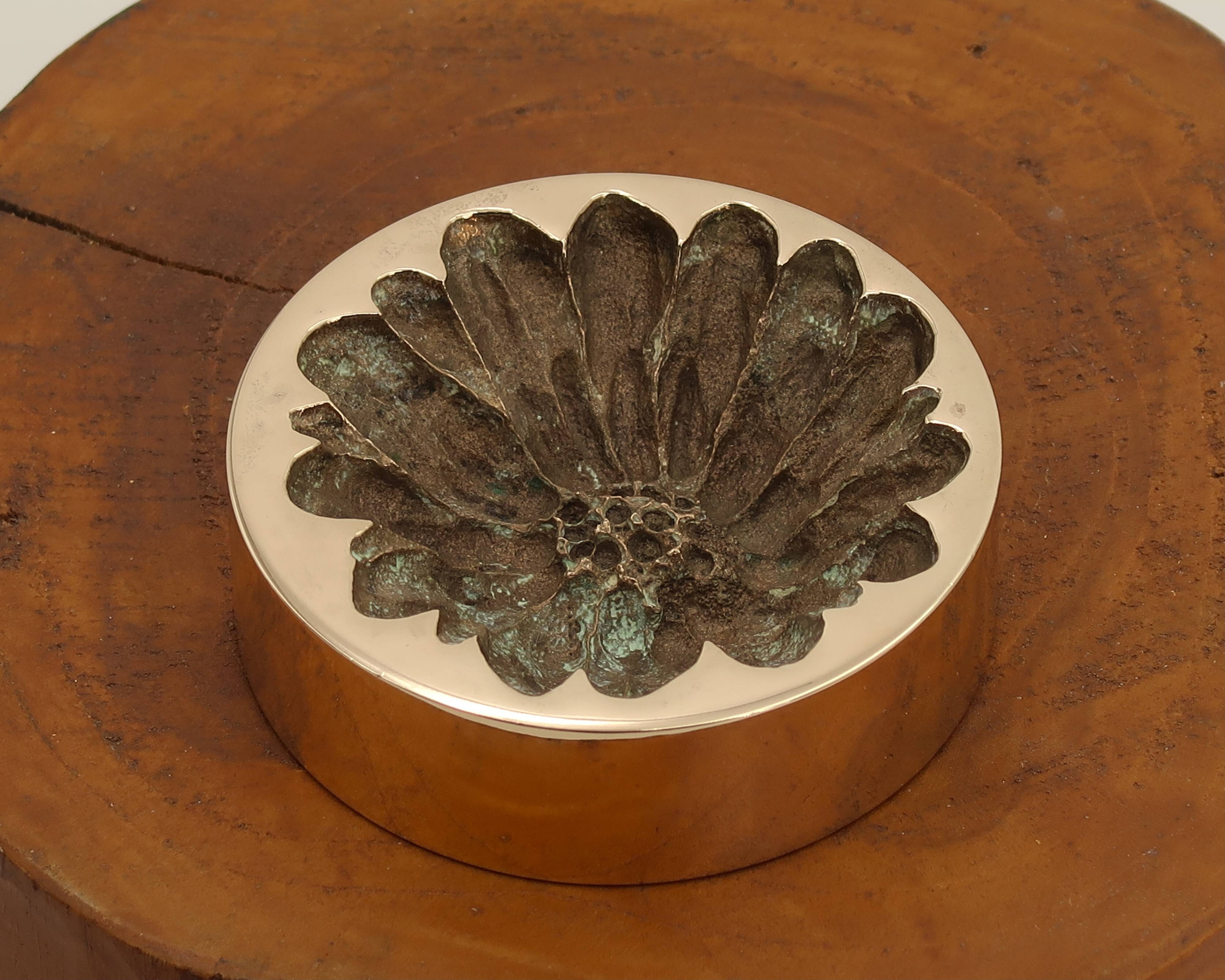 Bronze ashtray by Monique Gerber, flower imprint, 1970s.