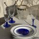 Set of 6 blue-footed champagne flutes; 3 pairs of designs.