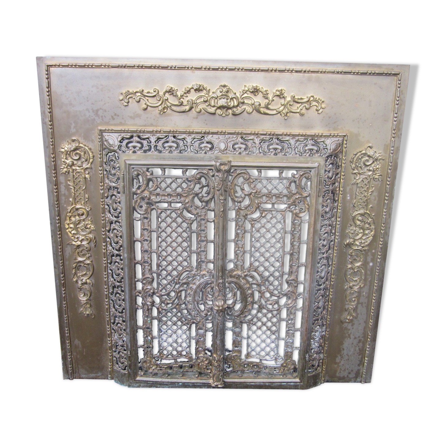 Front of the old fireplace all in bronze