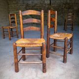 Set of 4 straw-covered brutalist chairs by George Robert
