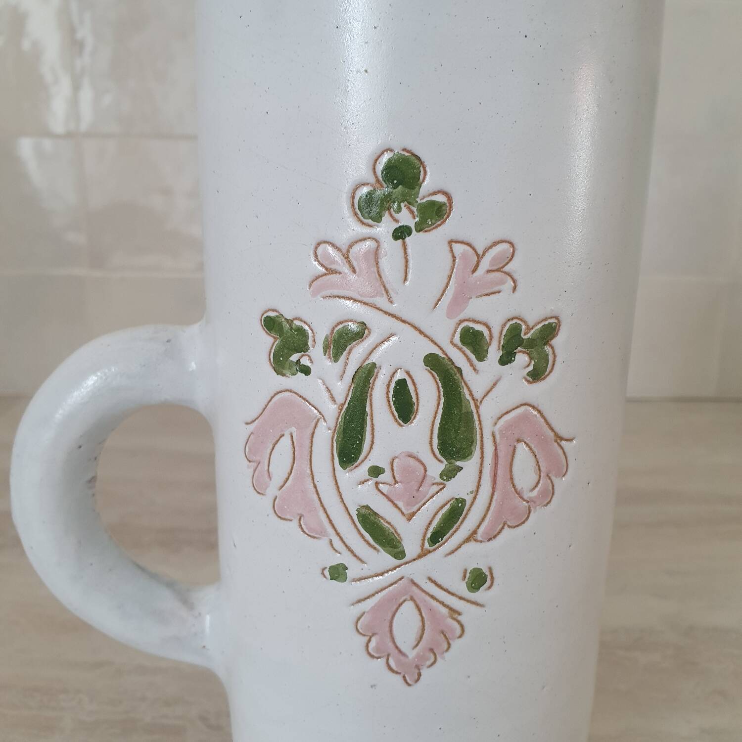 Large white jug with a pink pattern