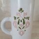 Large white jug with a pink pattern