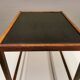 Smaller lamp/Side table of rosewood with black formica tabletop, designed by Kurt Østervig.