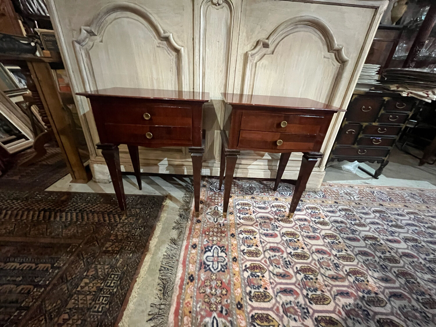 Pair of varnished mahogany bedside tables