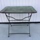 Folding riveted iron table