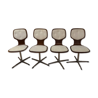Lot of 4 vintage swivel chairs in the style of Arne Jacobsen.